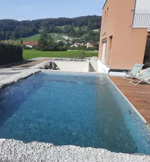 Pool mit Kies, Schmid-Erdbau, Erdbewegungen, Leiblachtal